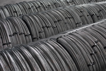 Coils of galvanized metal  steel rod wire in a warehouse