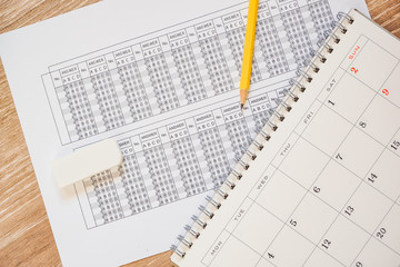 Calendar and mark sheet. Image of test date or examination date　カレンダーとマークシート試験日または検査日
