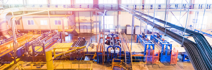 Fiberglass production industry equipment at manufacture background