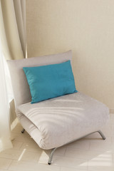 armchair sofa with blue pillow in the hotel 