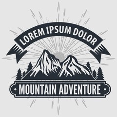 Mountain Adventure vintage label, badge, logo or emblem. Vector illustration.