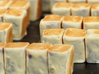 Fairy bean cake, or Xiandougao, it is a delicious food made from Low gluten flour, corn starch, butter, sugar powder, cheese, purple potatoes, eggs, condensed milk.