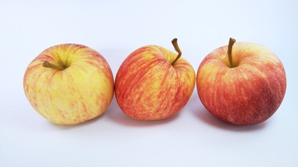 the red apples against white background