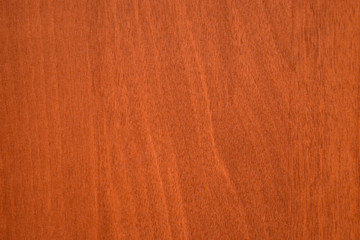 Wood texture with a red tint for background.