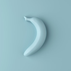 Naklejka premium The banana blue color on blue background.minimalist style