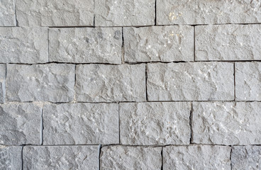 Wall with gray bricks as a background