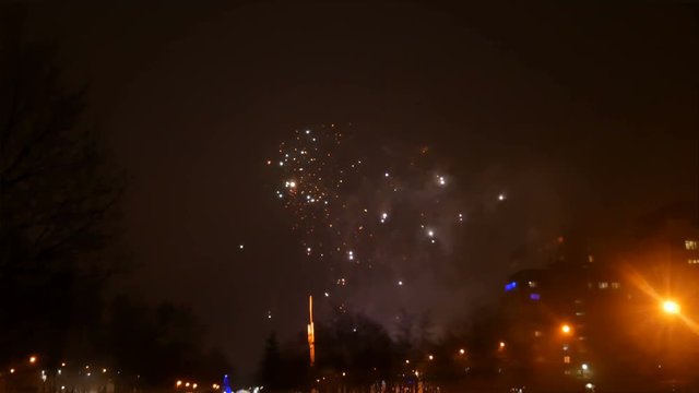 beautiful fireworks in the night sky in the city