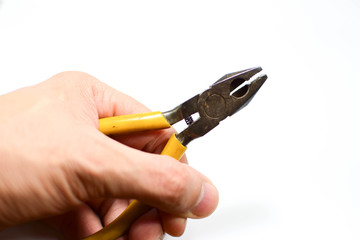 hand with pliers