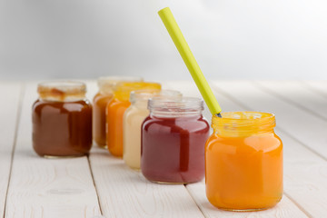 Opened jars of baby food