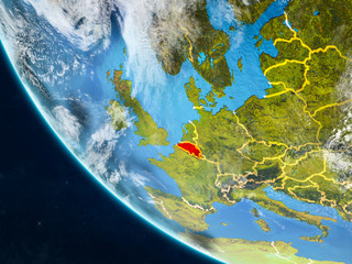 Belgium on planet Earth from space with country borders. Very fine detail of planet surface and clouds.