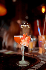 Bartender is stirring cocktails on the bar counter