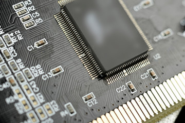 Close-up of electronic chip in desktop computer motherboard circuit.