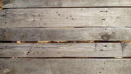 Peeled and faded plank wooden texture wallpaper.