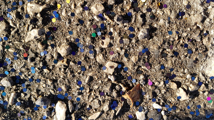 granite texture use for background, strewn with confetti