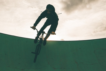 BMX rider doing tricks. Urban extreme sports