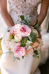 Beautiful wedding rustic bouquet with white roses and eustoma