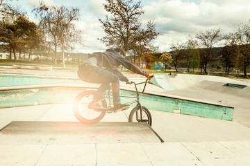 BMX rider doing tricks. Urban extreme sports