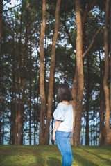 Happy young cute asian Japanese girl hipster backpack  women travelling looking at beautiful sky mountains scenery view