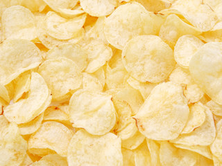 natural potato chips golden on a white background.
