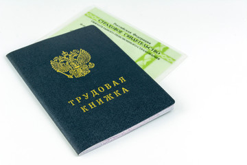 Russian documents. Work book,employment record, a document to record work experience. Certificate of pension insurance. On white background.