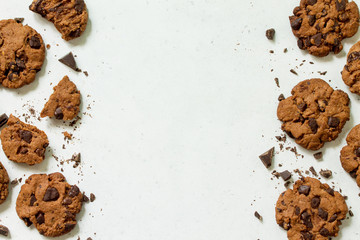 Baked Christmas cookies. Homemade Chocolate Chip Cookies on a light stone table. Top view flat lay background. Copy space.