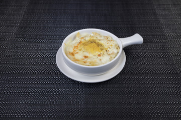 Close up view of plate with japanese food inside. Japan traditional food on wooden table.