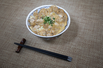 Close up view of plate with japanese food inside. Japan traditional food on wooden table.