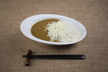 Close up view of plate with japanese food inside. Japan traditional food on wooden table.