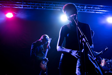 Fototapeta premium Musicians perform on stage in the club.