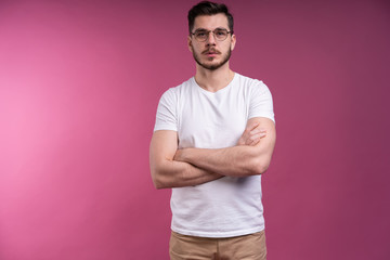 Portrait of happy fashionable handsome man in shirt looking at camera