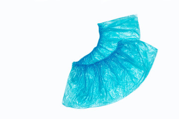 Obraz premium Disposable colored Shoe covers for shoes on white background