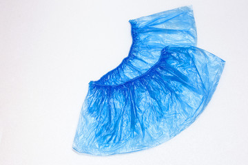 Disposable colored Shoe covers for shoes on white background