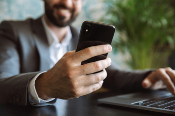Handsome young businessman dressed in suit