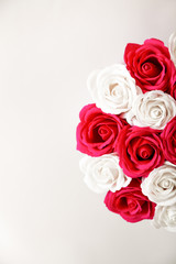 Red and White roses isolated on a white background with space for text