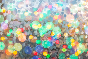 Festive elegant abstract background with bokeh lights and stars Texture.Defocused bokeh lights background.Abstract blurry texture with a lot of small bokeh.sparkle circle lit celebrations display.