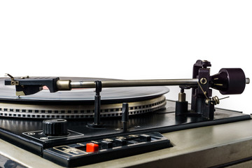 Fototapeta na wymiar Retro turntable vinyl record player. Vintage record player. Old analog audio equipment for sound enthusiast and professional disc jockey