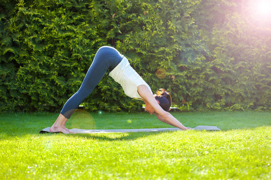 beautiful adult woman practicing yoga