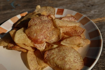 closeup group taro of french fries potato slices stick chip yellow crispy at Asia fresh market