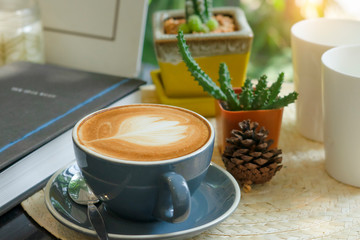 cup of coffee on table in cafe ,Morning light