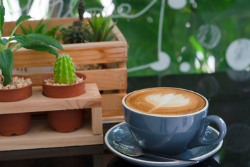 cup of coffee on table in cafe ,Morning light
