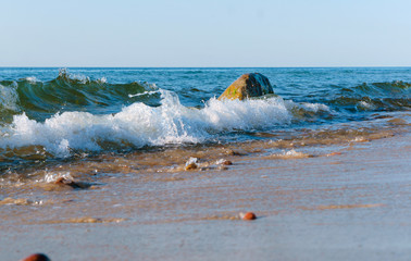 Sea coast. Waves and storms at sea. Waves on the Baltic Sea.