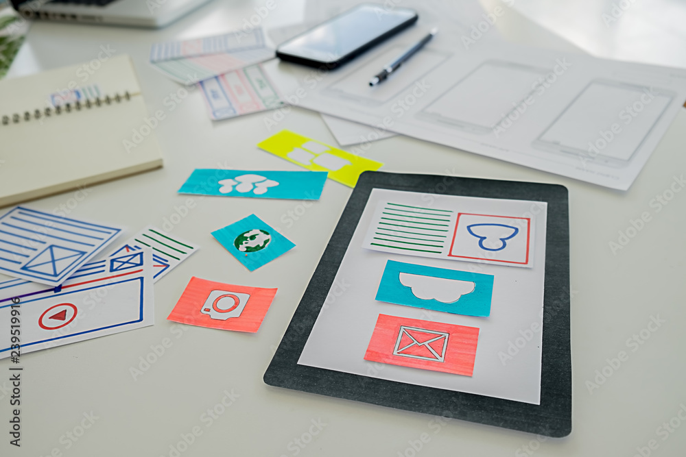 Wall mural creative web designer planning application and developing template layout, framework for mobile phon