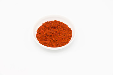 paprika spice in white bowl