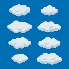 Cartoon Clouds Set on Blue Sky Background. Vector