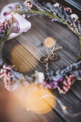 wedding rings in a wreath of lavender