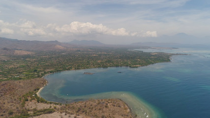 sea coast with tropical beach. aerial seascape tropical landscape, sea, boats on the surface water. Bali,Indonesia, travel concept.