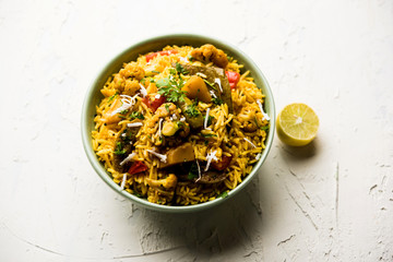 Masala Rice or masale bhat - is a spicy vegetable fried rice / biryani or Pulav usually made during wedding occassions in maharashtra, India