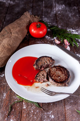 Fresh hamburger with tomato on plate