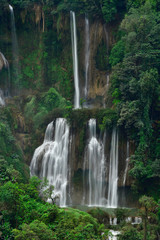 Fototapeta na wymiar Great waterfall in Thailand. Beautiful waterfall in the green forest. Waterfall in tropical forest at Umpang National park, Tak, Thailand.