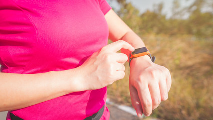 Women exercise in the morning with SmartWatch.